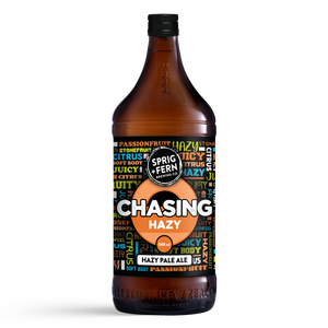 888ml bottle of Sprig + Fern Brewing Co. Chasing Hazy hazy pale ale with colorful label on a white background