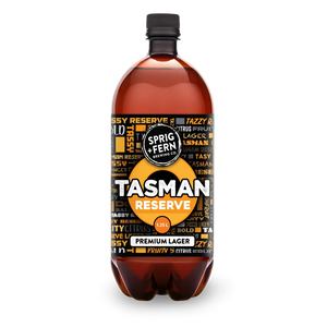 Bottle of Sprig + Fern Brewing Co. Tasman Reserve Premium Lager with a colorful label on a white background