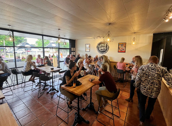 People dining and socialising in a the Little Sprig Wakefield tavern