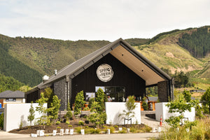 The front of the Sprig + Fern Marsden Tavern surrounded by hills.