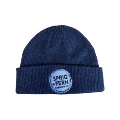 The Sprig + Fern logo on a knit beanie